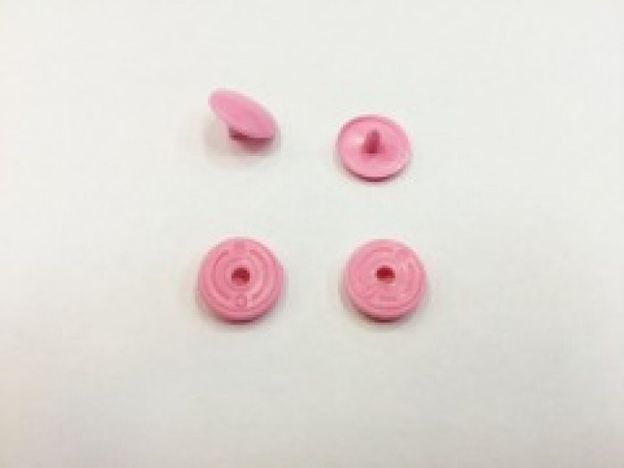 Кнопка пластиковая 10.5мм цв.розовый(в упак.1000шт)