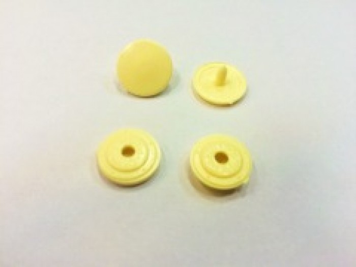 Кнопка пластиковая 10.5мм цв.св.желтый(в упак.1000шт)