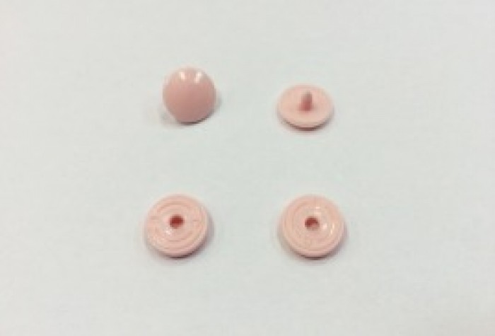 Кнопка пластиковая 10.5мм цв.св.розовый(в упак.1000шт)