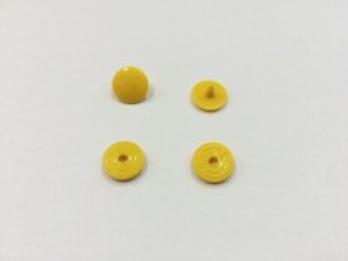 Кнопка пластиковая 10.5мм цв.т.желтый(в упак.1000шт)
