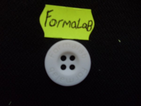 Пуговица с логотипом "Formalab" №40 22мм цв.белый